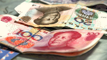 Российские компании готовятся платить за товары в юанях